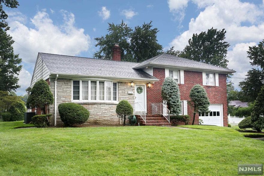 Gorgeous super clean all brick split level situated on quiet pretty street. Oversized formal living room perfect for entertaining. Formal dining room opens to covered patio. Spacious eat in kitchen. Upstairs features three good sized bedrooms with ample closet space. Upstairs full bath. Nicely sized den with full bathroom and convenient access to garage. Wonderful finished basement with bar. Meticulously maintained this home boasts central air, underground sprinklers, newer hot water heater (2021) and much more! Oversized lot 97 x 147, professionally landscaped with rear patio. Truly a must see to appreciate!