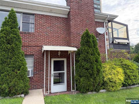 Photo of 1441 Palisade AVE, Fort Lee, NJ 07024 (MLS # 26032094)