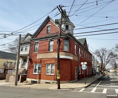 Photo of 94 Center Street, Clifton, NJ 07011 (MLS # 26008807)