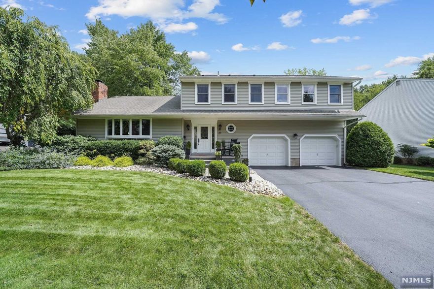 Tucked at the end of a cul-de-sac this house has been meticulous updated and the quality of workmanship is apparent. The residence opens to a foyer with an updated powder room which leads to a family room featuring a fireplace and built in book shelves. This flows seamlessly to a dining room with access to the jaw-dropping yard. If you are looking for a backyard oasis look no further! This features a newly build outdoor kitchen, deck, patio and hot tub. In the kitchen you will find granite countertop and a spacious flow to the living room. The final touch on this level is a very useful mud room. Upstairs there is comfort and space with a hall bath and large bedrooms. The master bedroom has a walk in closet and master bath. Heading to the lower level you will find a rec room, as well as an office and storage. If this is not enough the spotless 2 car garage, whole house generator & reverse osmosis are just some of the additional touches on a place truly made to be called HOME!