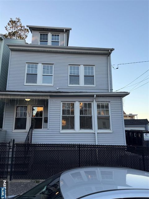 Photo of 530532 E 25th St, Paterson, NJ 07514 (MLS # 25039195)
