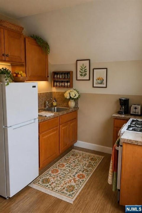 Photo of 147 Lincoln AVE, Orange, NJ 07050 (MLS # 26028644)