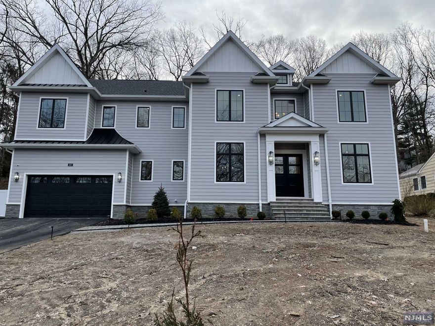 Brand New Construction w/ 10 year warranty Built by a local builder using quality materials & craftsmanship. Stunning Modern Farmhouse, 6 Bedrooms, 5.5 Bathrooms, First Floor features a two story entry foyer, living room, Dining Room, great room with soaring ceiling, Butlers Pantry, Powder Room, Large Chef's Kitchen with Carrera Marble Breakfast Room, with Sub-Zero and Wolf appliances & designer cabinets, walk in pantry, mud room, Guest room w/full bath, Large covered porch. Second floor has a Master Bedroom Suite w/ spa level bath, jaw dropping closets, 3 additional Bedrooms and two bathrooms. Laundry room. Full finished basement features: Large Rec area, Gym, Fully equipped Home Theater, Guest Bedroom and Full Bath. Other features: Hardie plank & stone siding, security system w/ cameras, sprinkler system, landscape lighting, Aprox 4900 sqft +1950 sqft (basement) of living space. Seller is a licensed realtor.