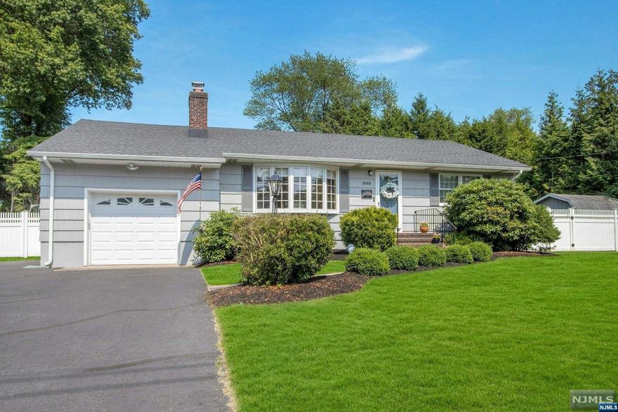 Immaculate Move-in Ready Updated Ranch in Norwood! The large living room includes a bay window and brick fireplace.So inviting! A gorgeous modern kitchen features white cabinets, Quartz countertops, stainless appliances and a breakfast bar/peninsula. A bright and open dining area, including a wall of windows and a door to the backyard. Two large bedrooms, an office/bonus room, updated full bath and half bath completes the main level. A spacious bedroom is featured on the second level. The fully finished lower level includes a large family room, laundry room and storage. Lush, professionally landscaped property offers a fenced-in backyard featuring a large deck - great for entertaining! Don't miss this beautiful home!