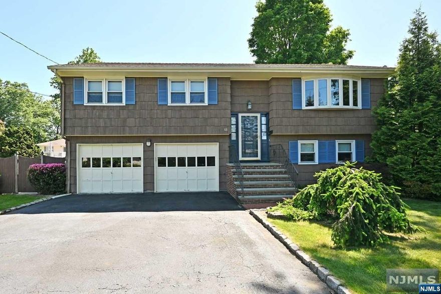 Here it is! Lovely 4 bedroom, 3 bath well-maintained bi-level in a great neighborhood. Light and bright. Hardwood floors. Pretty bow window in living room. Good wall space in the dining room. Newer eat in kitchen with granite counters, stainless steel appliances, breakfast bar and sliding door to the deck. Primary bedroom with bath, 2 additional bedrooms and full bath. Lower level family room, bedroom/office, full bath, laundry and access to the two-car garage. Pretty fenced property with patio and fire pit. Beautifully landscaped. Central air conditioning on upper level only. Don't miss seeing this exceptional home