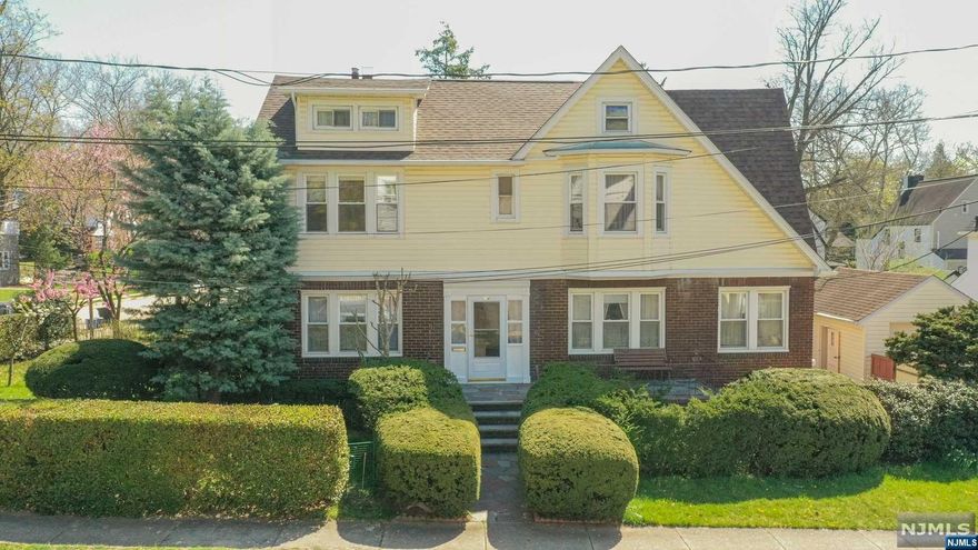 Welcome to this charming Single Family Home in Teaneck!!Spacious 4 bedrooms / 2.5 bath with finished basement and finished attic. First floor offers a large living room with fireplace, large dining room, ample kitchen and half bathroom. Second floor offers 4 bedrooms and full bath with access to the finished attic. The high ceiling basement offers a full bath, laundry room, open living space and a separate entrance. This house has been proudly maintained by the owners taking meticulously care of every single detail. Includes 1 car garage plus driveway. Backyard with beautiful landscaping and BBQ area. Features: New roof (Nov 2021), Boiler 2003, Water Heater (2018) Hardwood floor throughout. Desirable location!! Close to public transportation and major highways. Don't miss it!!