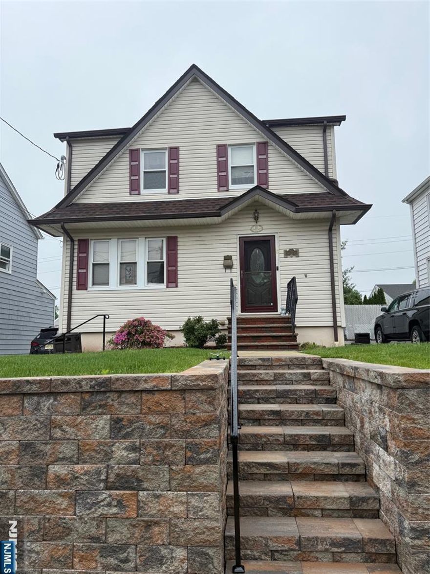 Make this charming 3 bedroom 1.5 bath colonial house, located on a great block in the desirable town Wood-Ridge, your home. First floor features a welcoming living room, a formal dining room and classic kitchen with granite counters and stainless steel appliances. There is also a bonus room that can be used as a TV room or office with sliding glass doors that lead out to a newer Trex deck, and paver patio. Yard also feature a large shed that could be a used as an entertainment space. Second floor boosts three lovely bedrooms, one full bath, and access to a walk up attic that can be finished for additional living space. The basement is partially finished with a 1/2 bath and utility room. The driveway can accommodate 3+ cars. The roof, hot water heater, boiler, retaining wall and electrical panel are all newer. Do not miss this opportunity. Limited showings. Do not use ShowingTime, contact listing agent.