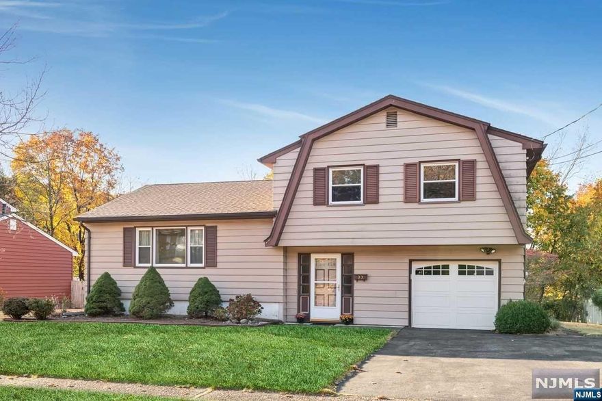 Location, Location, Location! This Unique Split Level home in desirable Meadowbrook Estates has so much room for everyone to enjoy! Large foyer greets you as you continue into the spacious FR w/large PR & exit to rear yard. Main level has large LR that opens to FDR. Both rooms have beautiful wood floors hiding beneath the carpet. Bright & sunny eat-in kitchen also has exit to spacious rear yard with paver patio. Three good sized bedrooms w/wood flrs, Master surprises you w/a bonus addition featuring walk-in closet & full bath. Another full bath on this level. Basement is partially finished w/a large Rec Room, & a good sized laundry room w/lots of room for storage. Replacement windows, property is fenced on 3 sides, central air & attached garage. 4 Levels of living just waiting for you to add your finishing touches & make it your own! Nestled between the elementary & high school. Close to NYC express park & ride, NYC bus a few blocks away. Restaurants/shopping/highways all nearby.