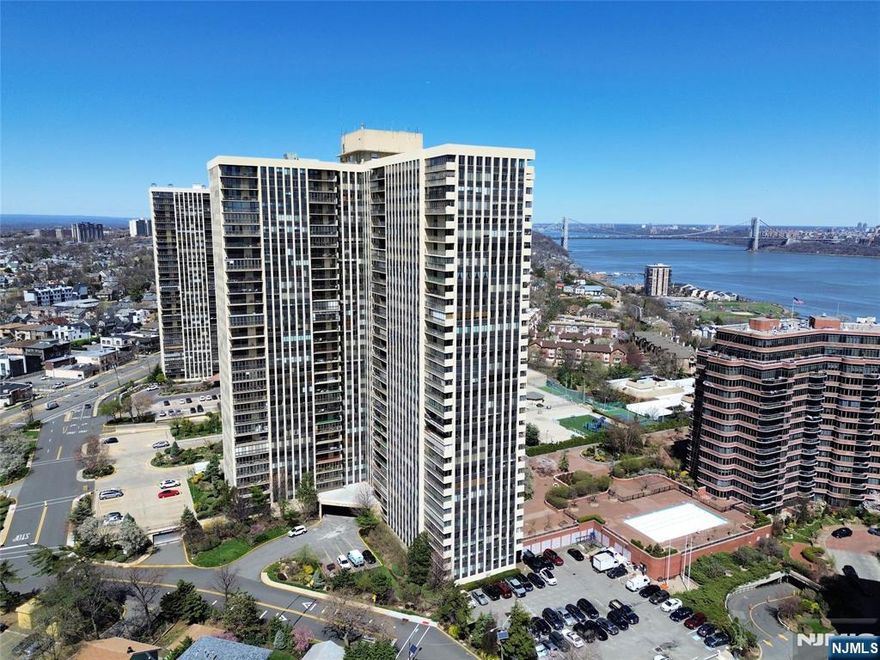 Perched high on the Palisades, you'll discover this rare 3 Bed/3 Bath corner unit with unobstructed views of the NYC skyline and Hudson River from every room. Offering 1,805 sq ft of pristine living space, this home features a massive open-concept living/dining room area, leading to a private terrace that looking above the cityscape. The chefâ€™s kitchen is outfitted with premium appliances, a wine fridge, custom cabinetry, and breakfast nook framed by rhe skyline. Each bedroom offers generous space, built-ins, and beautiful views; the primary suite features a walk-in closet and spa-like ensuite. Upgrades include all-new heating/cooling units, windows, and sliding doors. Full-service building with 24/7 doorman, pool, tennis, gym, sky lounge and plenty more. Storage unit included. Parking: indoor $75, outdoor $58, tandem $116. Minutes to GW Bridge, Lincoln Tunnel, I-80, I-95 & Rt. 46.