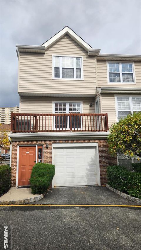 Photo of 221 Village Circle Dr #3218, Fort Lee, NJ 07024 (MLS # 25037451)