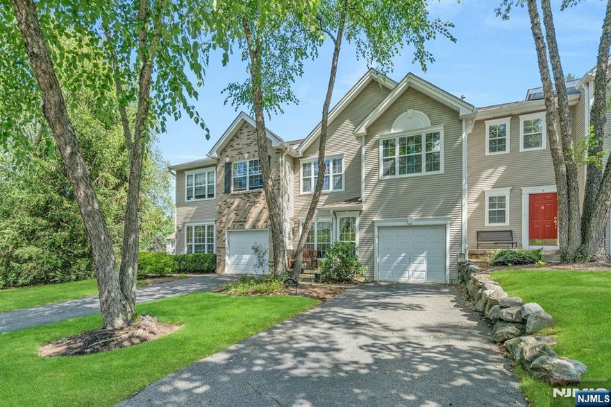 Welcome to the Birchwood Hills lifestyle! You will love this turn key home with entry foyer, formal living room, dining room, 2 story family room large windows and gas fireplace open to the eat in kitchen. The large sunny deck is ideal for entertaining and with access to an expansive lawn. The powder room and garage access complete the main floor. Upstairs you will find a primary bedroom with vaulted ceiling, updated bathroom, and 2 walk in closets with extensive shelving. The laundry room is conveniently located on the bedroom level. You will find 2 more bedrooms and a full bath to complete this level. The basement is spacious with luxury vinyl flooring and great for a home office, gym, play area, or family room. Enjoy the clubhouse with gym, meeting room, game room, bocce ball, pickleball, tennis, basketball, pool, and playground. Enjoy the proximity to the public library and schools which is right up the road. Enjoy the recreation that Mahwah offers including Campgaw for skiing, Darlington County Park for swimming and picnics, Ramapo Reservation for hiking. MacArthur Boulevard has great eateries and stores and is right around the corner. Enjoy bus and rail service nearby to Manhattan. This is not just a home...it's a lifestyle. For a private showing, please call Gary Silberstein at 201-647-4225.