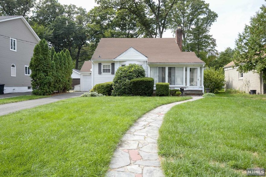 CHARMING AND UPDATED HOME ON DESIRABLE GLEN ROCK STREET, NEAR TO BUS/TRAIN, DOWNTOWN, LIBRARY AND BLUE RIBBON GLEN ROCK SCHOOLS. OPEN CONCEPT MAIN FLOOR FEATURES SUNNY LIVING ROOM WITH FIREPLACE, DINING ROOM, MODERN EAT-IN KITCHEN WITH STAINLESS STEEL APPLIANCES, MARBLE COUNTERS, FARMHOUSE SINK AND ELEGANT CONTEMPORARY STYLE. MASTER BEDROOM, UPDATED HALL BATH AND ANOTHER BEDROOM ALSO ON THIS FLOOR. FRENCH DOORS LEAD TO A DECK AND BACK PATIO AREA IN A SPRAWLING, DEEP LOT MARKED BY PARK-LIKE GROUNDS. ENCLOSED PORCH/SUN ROOM ON THE FRONT OF THE HOUSE. UPSTAIRS FIND LANDING WITH STORAGE AND OFFICE AREA, POWDER ROOM AND ANOTHER LARGE BEDROOM WITH BUILT-IN STORAGE. ENJOY EVERY CONVENIENCE, INCLUDING CENTRAL AIR, LAUNDRY, BASEMENT STORAGE AND OPTION FOR 1 FLOOR LIVING. THIS ELEGANT AND STYLISH HOME IN ONE OF BERGEN'S TOP TOWNS HAS EVERYTHING YOU COULD DESIRE IN A LOCATION THAT CAN'T BE BEAT. SOLD AS IS CONDITION