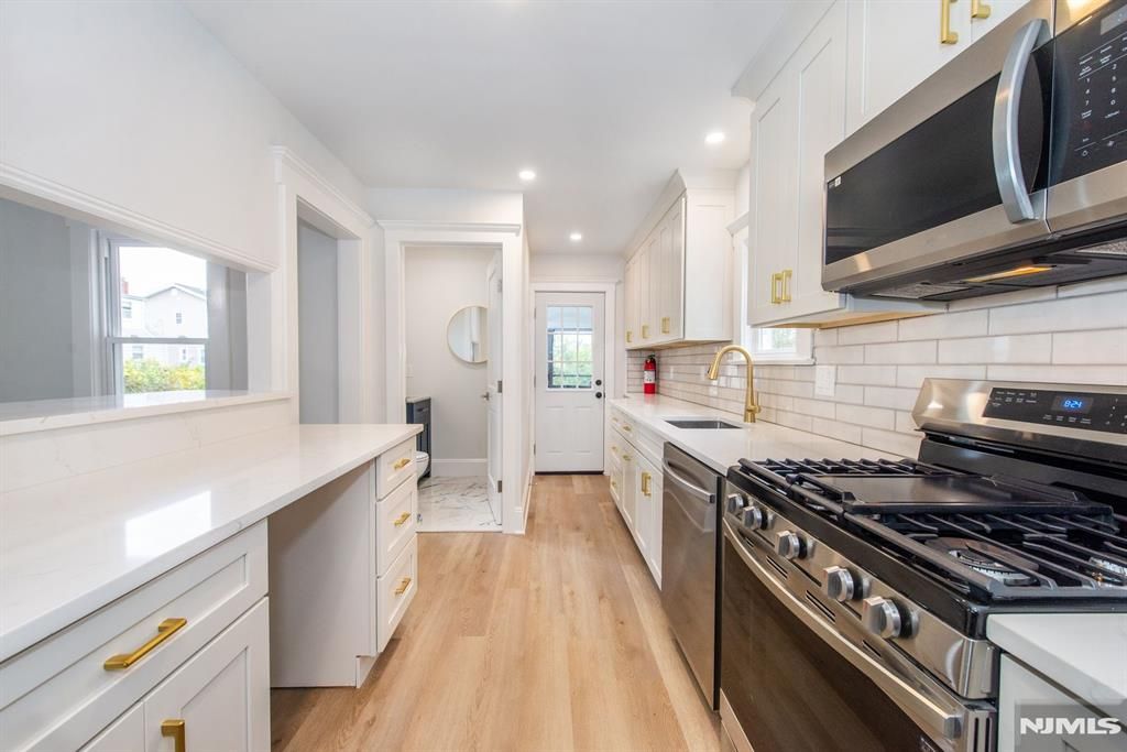 Photo of 118 Rutherford Avenue, Lyndhurst, NJ 07071 (MLS # 25038843)