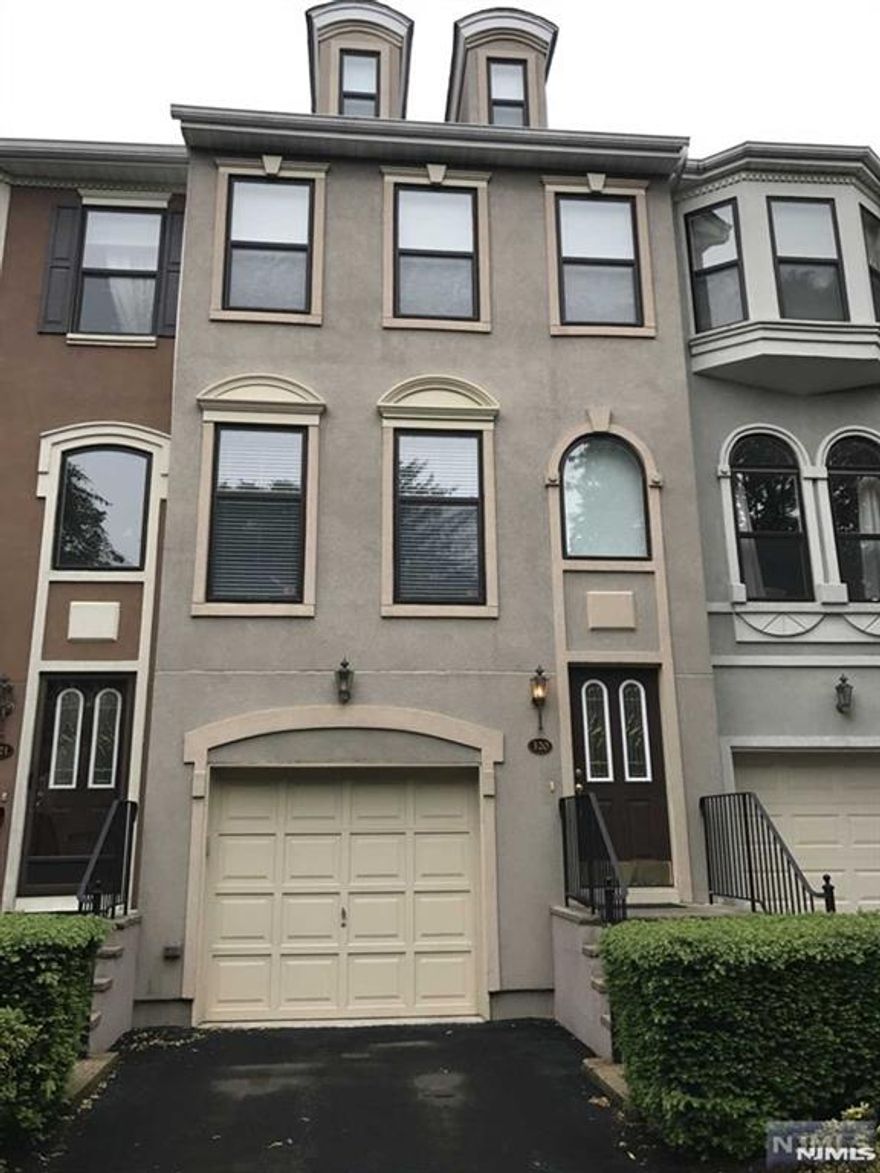 Tri-level brownstone in prime location, close to pool, tennis courts, clubhouse and gym. Lower level family room walks out to private patio with fountain view. Bright and airy unit features open kitchen with granite countertops. Master bath with Jacuzzi tub, double sink and stall shower. Clifton Commons shopping center with movie theater, Barnes and Noble, Target and supermarket is also steps away from complex.. NYC bus/jitney to train at front gate.