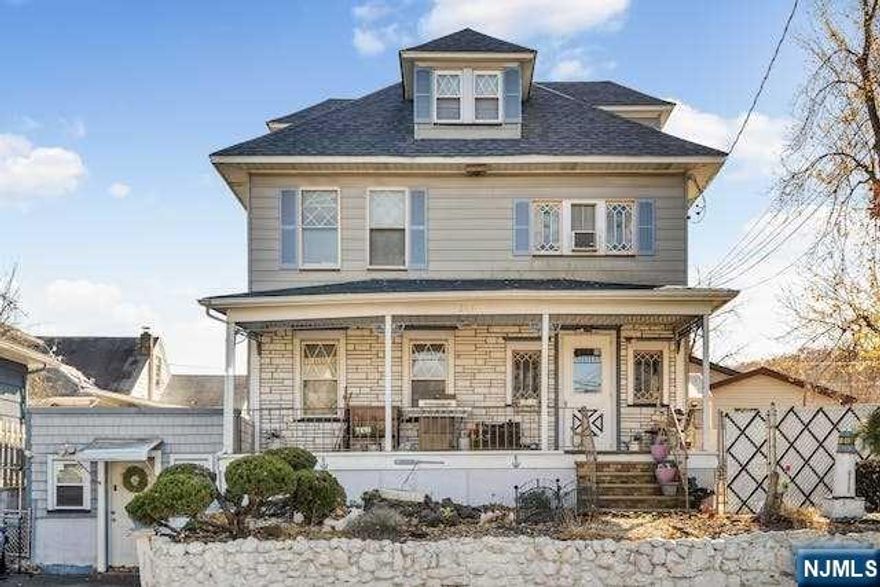 Close to restaurants/shops, Willowbrook Mall, NYC bus/train,and places of worship. Home offers large open front porch, entry foyer, LR with pocket doors to FDR, EIK with pantry, Upstairs three bedrooms each have ample closet space, updated main bath and access to the walk up attic. Full, finished basement with rec room with 2 large closets, full bath, laundry area & kitchenette. 1 car garage has been converted to living space. Heating system is not working, & home is in the process of being winterized. Home being sold strictly "AS IS". Seller will be replacing stove.