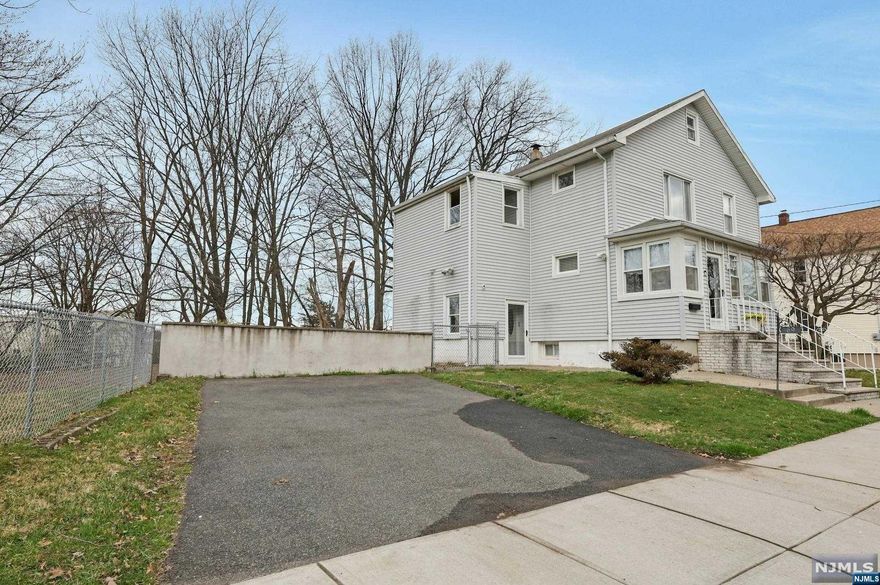 2 family home with wide driveway parking, last house on a dead end street on just under a quarter acre lot, adjacent to a walking path and a block away from the Nutley border. Lovely secluded and private area. Both units are owner occupied and will be delivered vacant at closing. 1st floor has 7 rooms, 2nd floor has 5 rooms. Each unit has 3 bedrooms and bath. 1st floor has an additional front enclosed porch and a family room in rear. Wood floors, large kitchens & tiled baths. Full unfinished basement with high ceilings, laundry hook ups and possibilities for future improvement. Pull down stairs to floored and semi-finished attic. 3 zone gas hot water baseboard heating system, 1 gas hot water heater, 2 separate electric meters, 3 gas meters. All windows are vinyl replacement tilt windows. Lot is triangle shaped, front width is 100' rear lot width is 7' right side is 100' and left angle is 137'. Terrific property for owner occupant and collect rent!