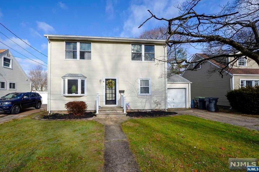 Expanded colonial! Situated on a lovely in a lovely residential neighborhood, this home is sure to impress you! Living room, entertainment sized dining room opens to updated kitchen with sliding glass doors to deck. First floor also features a bedroom and 1/2 bath with laundry. Upstairs features large primary bedroom with walk in closet and full bathroom. In addition there are two more good sized bedrooms and another full bathroom. The unfinished basement has a high ceiling and loads of potential. One car attached garage. This home is a must see to appreciate!!