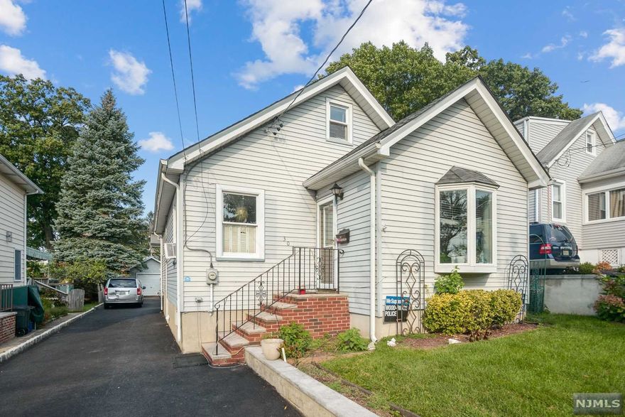 OPPORTUNITY CAN BE FOUND ON ONE OF WOOD-RIDGE'S MOST DESIRABLE STREETS LOCATED JUST 1 MIN FROM NYC BUS OR NJ TRANSIT TRAIN AT WESMONT STATION, AND ONLY 1 BLOCK FROM ELEMENTARY SCHOOL. THIS 3 BEDROOM 2 FULL BATH HOME WITH A PARTLY FINISHED BASEMENT, RESTS ON A 138FT DEEP LOT WITH A DETACHED GARAGE AND PARKING FOR AT LEAST 4-5 VEHICLES. WHETHER YOU'RE LOOKING FOR A STARTER HOME OR A WONDERFUL CANVAS TO CREATE/EXPAND AND MAKE IT YOUR DREAM HOME, THIS IS THE PERFECT LOCATION TO DO IT.