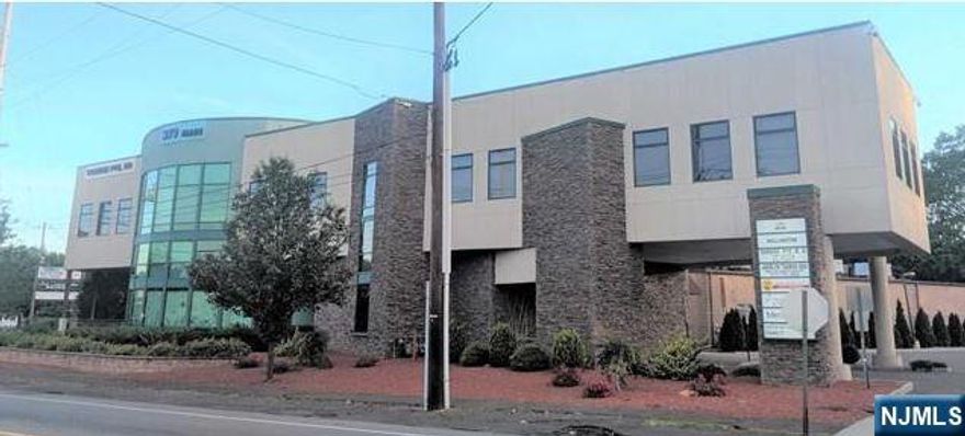 Well-maintained commercial office space (360 sq. ft.) located on the 2nd floor, offering excellent visibility and a large parking lot. Ideal for professional services or business ventures. The building features an elevator, central air conditioning and heating, and is shared with other well-established businesses, providing a clean and professional environment.