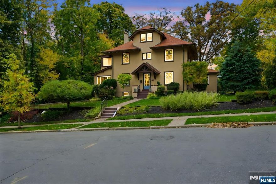 Donâ€™t miss this rare opportunity to own a beautifully maintained and thoughtfully updated 5BR, 2.5 BTH center hall Colonial with historical charm & modern updates, on an extraordinary 103 x 147 park-like lot in the best location in Nutley! This huge property offers privacy and space thatâ€™s increasingly hard to find. A welcoming foyer with original parquet floors leads to rich hardwoods throughout. The renovated open-concept kitchen and dining area features high-end appliances, a center island, and picturesque backyard views, perfect for everyday living and entertaining. The first floor also includes a renovated full bath, laundry, and a gracious living room with a wood-burning fireplace, original Chestnut trim, coffered ceilings, built-ins, and wainscoting, timeless details rarely found in newer construction. A sun-drenched four-season sunroom adds flexible space for a den or office. Upstairs offers four spacious bedrooms, an updated full bath, and a second sunroom off the primary, ideal as a private retreat. The third level includes a fifth bedroom and additional storage. The finished basement expands the living space with a summer kitchen suited for multi-generational living, a powder room with room to expand, guest space, and rec area. Ductless AC on the first floor adds modern comfort. Complete with a 2-car garage, driveway parking for 8+cars, and a large shed, this home sits on a quiet, tree-lined street near all of Nutley's Parks, with easy access to NYC transportat