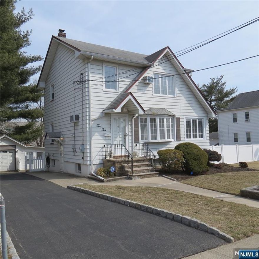 Charming updated Colonial on a large level lot .offers NEW kitchen, refinished and laminated flooring, plus freshly painted! Newer windows, updated electric, NEW above ground oil tank. While the basement is unfinished yet spacious and serves as a utility, laundry, storage area offering plenty of opportunity for customization. The oversized fenced in yard is perfect for entertaining, gardening or simply relaxing. This home is brimming with potential and ready for your personal touches.