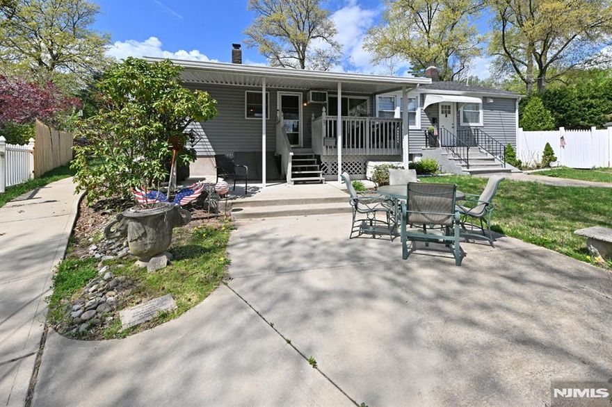 Why rent when you can own your own home !! Great price for a starter home in this hot market in the desirable town of Clifton NJ ! House has great curb appeal with a nice front patio & garden area plus a relaxing front porch, & covered BBQ area, and is located on a dead end street! Additional features include 2 BRs and a HUGE family rm which could be a massive 3rd BR as a primary BR if preferred, or used as the fabulous family room that it is currently! Also 2 bathrooms (1 full, 1 half) kitchen & dining area. Large basement with laundry, storage and possibilities for finishing a portion for more living space if preferred! Private backyard! Also a new roof, new siding, new hot water heater, newer furnace & some replacement Anderson Windows! All this and just a block from NYC bus, only 15 miles from the George Washington Bridge, and in the desirable Great Acquackanonk Section of Clifton! SUPER LOW TAXES TOO !!! FYI: Take a look at the renovations that the neighbors at 25 Hamil did to show you what could be done in this property ! Dont miss this opportunity !