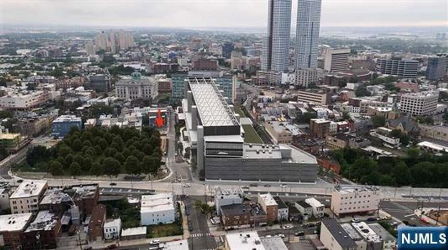 A unique and rare real estate development opportunity awaits in the vibrant JSQ section of Jersey City. This property is strategically located in a prime area, surrounded by new construction projects, and offers an unparalleled location just steps away from the newly built Jersey City Courthouse. Conveniently situated just minutes from the Journal Square Path Train and offering easy access to the Holland Tunnel via 139, this property boasts approval for over 20,000 square feet of buildable space. The development plan includes a six-story building with 29 units comprising Studios, 1 Bedroom and 2 bedroom micro units, along with 15-20 parking spaces. Surrounded by a thriving community of newly constructed rental buildings, condo developments, and a variety of retail establishments, this property presents an attractive opportunity for residents seeking to immerse themselves in the bustling and dynamic business district of Journal Square. Don't miss out on this exceptional chance to secure a financially promising venture in a high-demand area. Contact today to explore this amazing opportunity further.