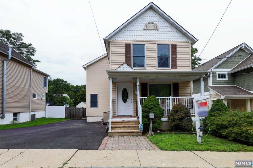Located at a dead end street. The house was expanded in 2005. All the bathrooms and the kitchen were done in 2005 including roof, siding, windows, central air, deck. First floor has a living room, powder room, bed room, kitchen and a family room. Second floor has 2 bedrooms, full bath, master suite with a full bath and walk in closet. Basement is partially finished with a separate entrance. Gas heat. Laundry in the basement. Driveway is 2 car wide, was recently done and can fit 5 cars. Fenced back yard. VERY short distance to NYC bus and train.