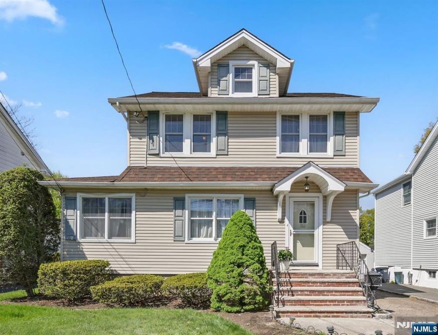 Settle into the life youâ€™ve been working toward in this timeless 3-bedroom Colonial, just moments from top-rated schools, parks, and easy transportation. Rich hardwood floors, a bright sunroom/office, a spacious kitchen, and formal dining room create the perfect backdrop for everyday living and unforgettable gatherings. A stunning cathedral-ceiling family room with a cozy fireplace delivers the space and warmth todayâ€™s lifestyle demands. A walk-up attic offers the perfect art or hobby studioâ€”or easy-access storageâ€”while the full unfinished basement with new furnace presents endless potential for future living space. Step outside to your private yard, ready for your visionâ€”from garden oasis to play space. All set in a welcoming neighborhood where evening strolls and a true sense of community come naturally. Excellent Schools. This is where your next chapter begins.