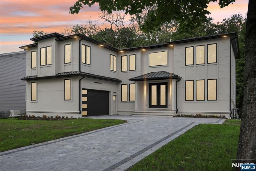 Welcome to this luxurious New Construction Colonial home, offering over 6,400 sq ft of finished space in a thoughtfully designed layout, backing to nature reserve! Featuring 6 spacious bedrooms and 5.5 designer bathrooms, this residence blends timeless architecture with modern elegance. Step inside to an open-concept floor plan filled with natural light and upscale finishes. Expansive two-story living room boasts a dramatic wall of windows framing views of the adjacent nature reserve. A marble fireplace anchors the room, while a one-of-a-kind custom mural adds a striking artistic focal point. Gourmet kitchen features top-of-the-line appliances, a large walk-in pantry, and custom cabinetry. The dining areas flow seamlessly, creating an ideal setting for both formal entertaining and relaxed family gatherings. First floor also includes a private guest suite, powder room, mudroom, and direct garage access The palatial primary suite is a true retreat, complete with a spa-like bath, oversized shower, soaking tub, and an oversized walk-in closet. Each additional bedroom offers generous space and en-suite/shared baths with premium fixtures. The fully finished basement includes an enormous recreation room, kitchenette, private gym, home theatre, as well as an additional bedroom & full bath. The property backs directly to a protected natural reserve - a rare and tranquil setting.