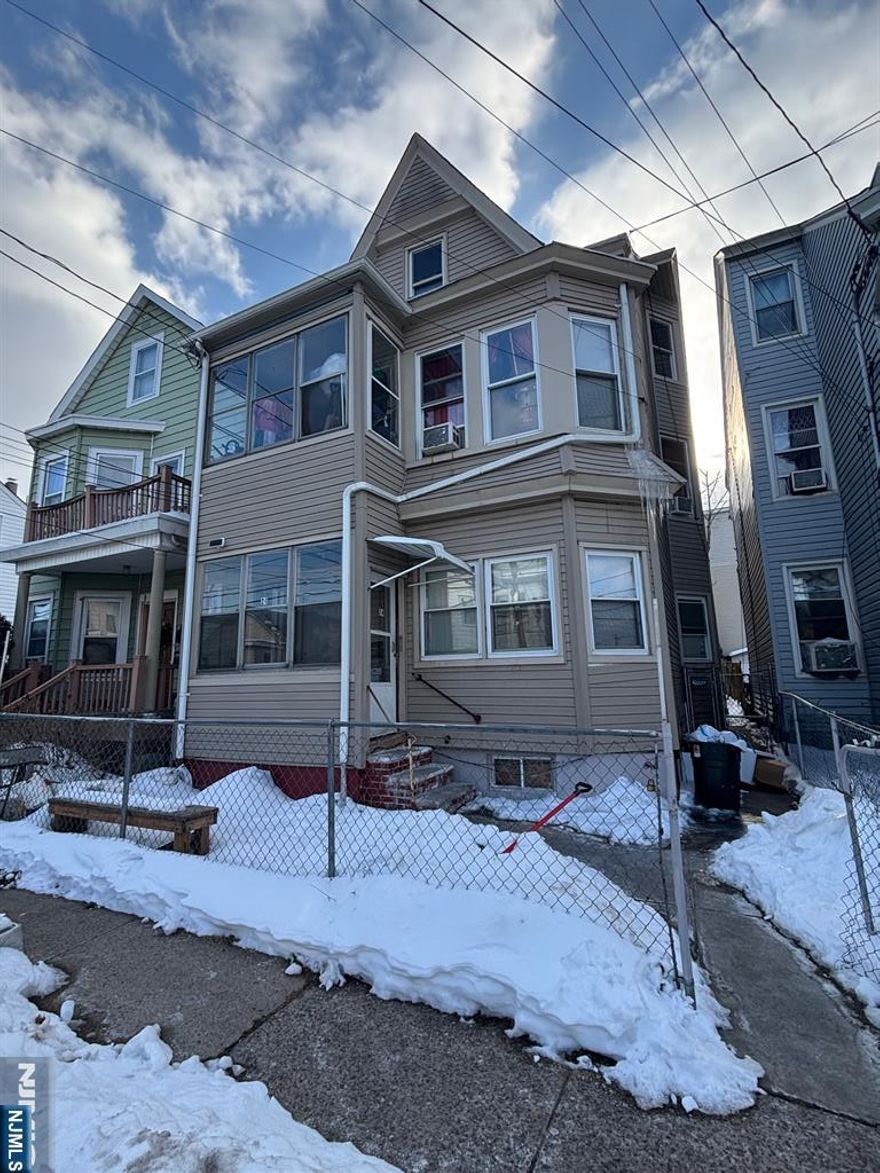 Priced to sell! This 2 family property has 3 beds 1 bath and an eat in kitchen and living room on both the 1st and 2nd floors. There is also a finished attic w/ 3 rooms and a full bath, and a finished walk out basement with another full bathroom! Located in a desirable part of the city close to local houses of worship, schools and shops this property will not last long! All current tenants on month to month leases perfect for owner occupany or investor alike! THE PROPERTY IS BEING SOLD AS-IS