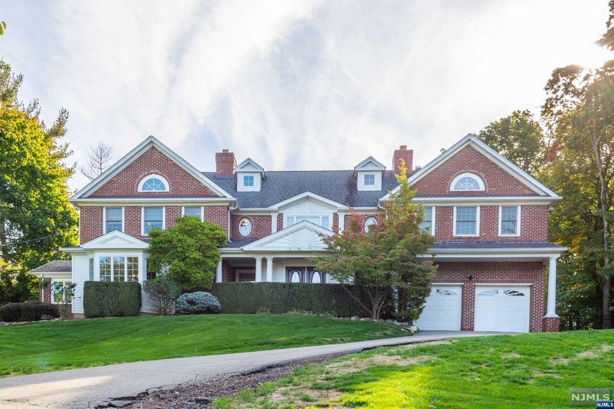 WELCOME HOME! Beautiful 4/5 bedroom, 3.5 bath Georgian Colonial that sits on 1.3 acres of land with lovely manicured property. This home has been extensively renovated over the years including fully bricked exterior, new family room w/fireplace. New Master bathroom, 2 guest bedrooms, office/bedroom and sunroom on first floor, including all new windows. Roma Steam Shower, 2 person jacuzzi and sub zero refrigerator. Double Walk In Closets. Newer in-ground gunite pool to enjoy in your own private backyard oasis. Gourmet style kitchen. All high end appliances with no expense spared! Custom cabinets, granite counter tops and wet bar with wine fridge. Great room off kitchen with fireplace, elegant formal dining room and living room with fireplace as well. (3 fireplaces in all) Come and enjoy this lovely home with all it has to offer!