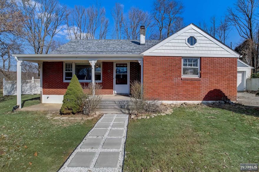 This charming and cozy home has modern touches & sits on a large lot in a very quiet neighborhood! Conveniently located only minutes away from Routes 23 & 287. Not a drive-by, larger than it appears. Featuring a new roof, renovated bath, new kitchen, new septic, enormous 2 car garage & lots of land! On the 1st floor, there is a living room, eat in kitchen, bedroom, office (need to add a window to be a bedroom), family room/enclosed porch & laundry room. Large renovated kitchen w/ white shaker cabinet & granite counters w/ tons of cooking room. On the 2nd floor, there is a loft style room w/ a bedroom & plenty of storage. In addition there is an oversized attached 2 car garage w/ a driveway for at least 4 more cars. Home is considered a legal 2 bedroom plus office. Public road has been recently paved. Enjoy a peaceful stroll through nature at the Apshawa Preserve, go hiking at one of the nearby trails or relax on the beach of the beautiful High Crest Lake!