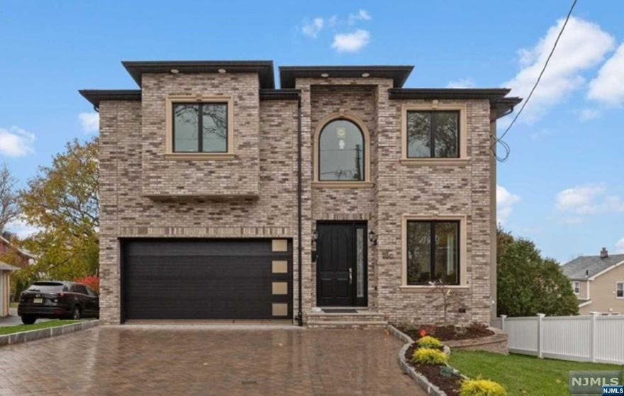 Looking for a home that combines the classic beauty of colonial architecture with contemporary design elements? Look no further than this newly constructed custom-built single -family Home! Built with bricks in a blend of colonial and modern styles, this house boasts a stunning curb appeal that's sure to catch your eye. located near Broad Ave, you'll be just moments away from a variety of restaurants, shops, banks, schools, and churches, making it a perfect spot for family. Inside you will appreciate the high-end appliances, custom countertop and beautiful fireplace that make your living space feel cozy and elegant. With 10-foot ceilings and a fully finished basement. The gourmet kitchen is sure to please any chef with plenty of space to create culinary delight. Don't let this one-of-a-kind property slip by! Schedule a showing appointment to see for yourself everything this beautiful home has to offer!