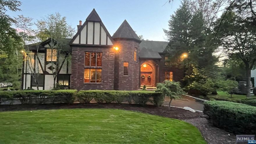 Prime EAST HILL location sits this stately, impressive 4 BR home w/modern Allmilmo kitchen cabinets, sleek floor plan boasts plentiful windows creating natural light throughout, Formal LR, DR w/wall of glass facing the lush rear grounds. Open concept from the EIK w/door to deck, family rm which opens to handsome two story billiard rm w/built-ins. Retreat upstairs to primary bedroom w/sitting area, spa style bath w/jetted tub, private shower & water closet, two trendy vanities, along w/separate styling area. From master you can reach the loft style office w/custom built-in bookcase & desk. 3 additional good size bedrooms w/generous closets, & hall bath. The walk out lower level features wine room, brick fireplace, family rm, eating area, full bath w/sitting area, gym, enormous laundry rm, & plenty of closets. Stroll outside to paver patio w/plenty of outdoor living space, fire pit, large, flat, gorgeous grounds. Circular driveway w/parking space for approx 10 cars & much more.