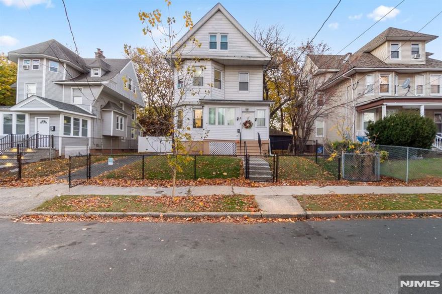 This Colonial home offers 5 bedrooms, 1.5 baths, and a comfortable layout designed for everyday living. The main floor includes multiple living areas plus a powder room, giving you plenty of space to spread out. Upper-level bedrooms provide added flexibility for different needs. A screened porch, walkout basement, off-street parking, and a detached 2-car garage make this property practical and functional inside and out.