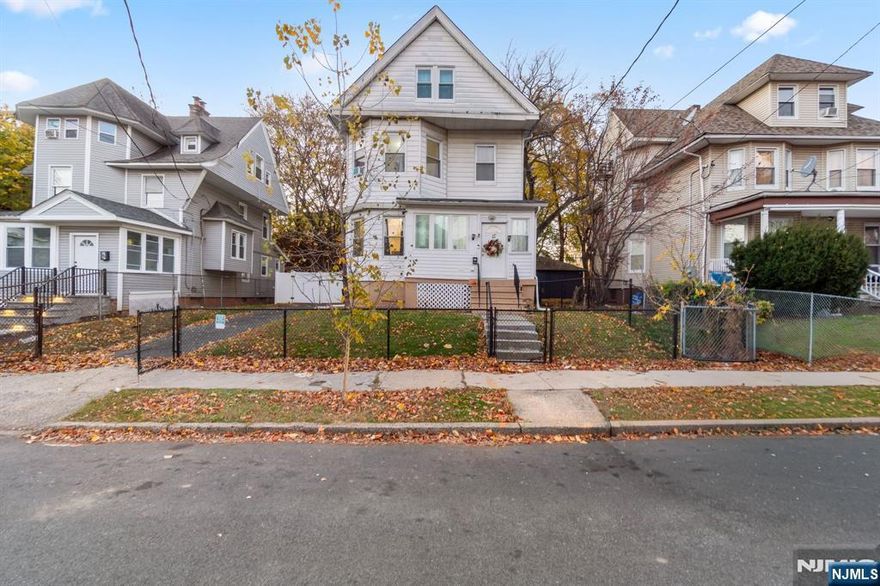 This Colonial home offers 5 bedrooms, 1.5 baths, and a comfortable layout designed for everyday living. The main floor includes multiple living areas plus a powder room, giving you plenty of space to spread out. Upper-level bedrooms provide added flexibility for different needs. A screened porch, walkout basement, off-street parking, and a detached 2-car garage make this property practical and functional inside and out.