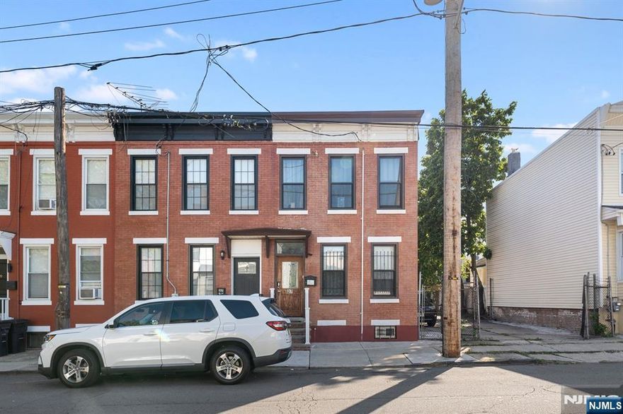 Located in the heart of downtown Newark, 37 Emmet Street offers an exceptional opportunity for both homeowners and investors alike. This single-family home combines modern updates with unbeatable convenience, making it a standout choice in todays market. Recently renovated and maintained in immaculate condition, the home features three generously sized bedrooms and 2.5 bathrooms. The thoughtfully designed layout includes a living room, formal dining area, and a beautifully updated kitchen perfect for both everyday living and entertaining. Additional highlights include central air conditioning and forced hot air. What truly sets this property apart is its prime location. With close proximity to Newark Liberty International Airport, Elizabeth Port, and the Newark PATH station, commuting is effortless. Nearby bus routes provide easy access to major transportation hubs and surrounding areas, making this an ideal home for those who value accessibility. This property is a perfect alternative to condominium living offering the benefits of a single-family home without the burden of HOA fees. Whether you are a first-time buyer looking to put down roots or an investor seeking a rental-friendly location with strong demand, this home checks all the boxes. Do not miss the chance to own a move-in ready home in one of Newark most convenient and connected neighborhoods.