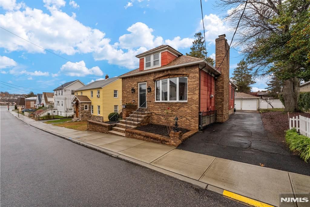 Photo of 63 Washington Street, Lodi, NJ 07644 (MLS # 25034585)