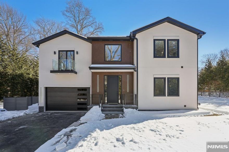 Stunning New Construction Contemporary in Prime Closter Location! This 5 bedroom, 4.5 bathroom, architecturally striking with a dramatic double-height foyer covers 3,285 SF of thoughtfully designed with exceptional craftsmanship, premium finishes and modern elegance throughout. The open and airy layout flows seamlessly into expansive living room showcasing a sleek linear fireplace framed in porcelain tile, creating a perfect balance of warmth and modern sophistication. At the heart of the home is a show-stopping chefâ€™s kitchen, complete with custom cabinetry, quartz countertops, a large waterfall island, premium stainless-steel appliances. The triple sliding glass door opens to a great paver covered patio, plenty of yard space for entertainment. Upstairs offers spacious 3 bedrooms with Jack & Jill & 1 full bath. The primary suite with private balcony features generous closets, spa bath with dual showers, dual vanity & modern soaking tub. Lower level space is completely finished with a private office, half bath, home theater, and large family room. Convenient location for access to all major highways, shopping, and dining. A rare opportunity to own a brand-new, move-in-ready luxury home in one of Bergen Countyâ€™s most desirable towns. Seller is Licensed agent.