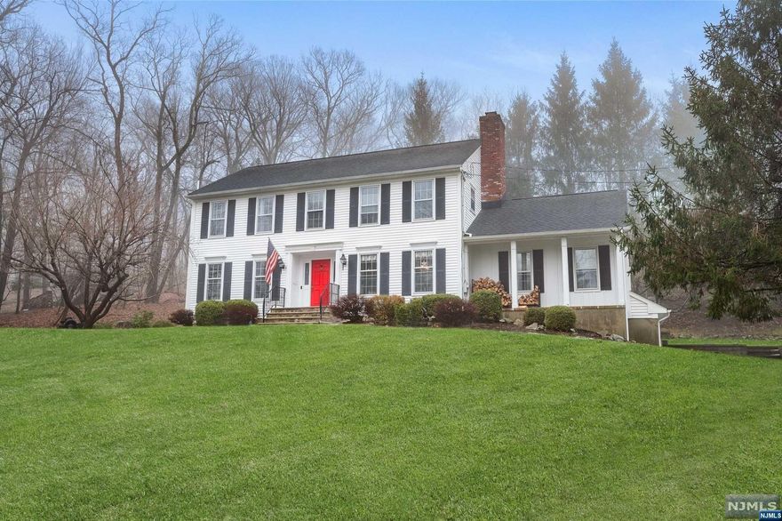 Home Sweet Home! This is the one you have been dreaming of... beautifully updated and meticulously maintained 4 bedroom 2.5 bath Center Hall Colonial. Luxury features include renovated kitchen (2022) w/top of the line stainless steel appliances, granite counter tops would sure to please any gourmet chief. Banquet size formal dining room perfect for hosting large scale gatherings. Gorgeous rustic family room w/wood burning brick fireplace and original wood beams. Charming living room w/slider outside. The 2nd floor features enchanting owners suite w/LUXE updated full bathroom plus large walk-in closet. Three additional bedrooms and updated full bath complete this level. Unfinished lower level lends itself to endless possibilities with extensive storage. Just sit back and unwind in this stunning-private retreat. Ideal for entertaining or casual gatherings. Don't miss this exquisite home! Convenient Bus stop to NYC located approximately 1 mile from the home. HURRY IT WON'T LAST