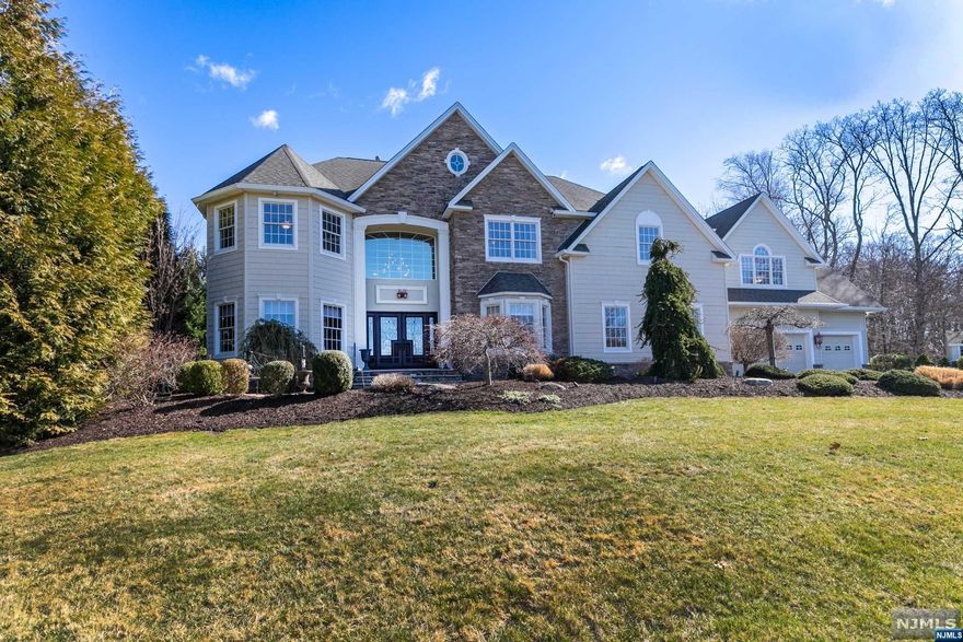 Prepare to be impressed! Stately colonial situated at the end of a private cul-de-sac in one of the most sought after neighborhoods in town! From the grand double doors, the 2-story great room w/stone fireplace, to the full finished basement, plus custom extra wide window & floor moldings, the list of features & details is long! Main floor consists of the pool room or formal living room, a formal dining room adjacent to a large den/2nd living room. The eat in kitchen w/large center island boasts beautiful cherry cabinets, granite, SS appliances & a newer 42" fridge. The kitchen looks out over the great room which is short distance from 1 bedroom & full bath. Upstairs you have the primary bedroom which offers tray ceilings, an ample sitting area & separate additional office space! The primary bath shines w/custom cabinetry, jetted tub & oversized shower! The additional 3 bedrooms all offer large walk in closets. An ample laundry room is located on the 2nd floor w/attic access.