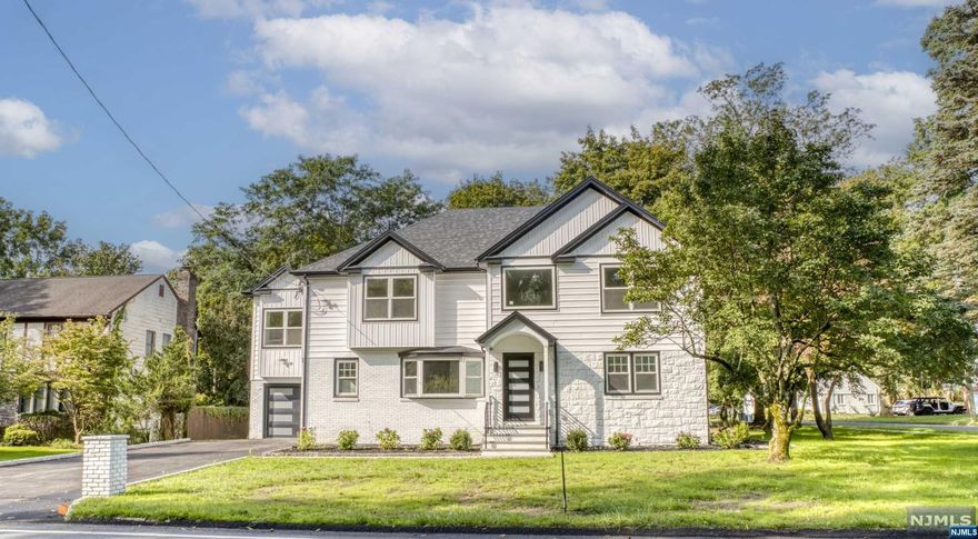 Brand new totally rebuilt and transformed colonial, fresh, modern design with an open concept layout. You will be greeted by a 2 story entryway, formal LR, DR, office/bedroom. Large modern kitchen with S/S appliances, quartz countertops, large island for all your family meals, sliding glass doors open to a stone deck and a large patio bellow for all your outdoor entertaining. Across from the kitchen is a large great room with fireplace. Second floor; large primary suite with 2 over sized walk-in closets and a primary bath with soaking tub, additional 3 large bedrooms, family bath and laundry room. Finished basement with a giant rec room, bonus room w/ window and closet This home is practically new construction as everything is new except 4 brick walls and foundation. Everything else is new, electrical, plumbing, sewer lines, gas lines etc. 3200 sq ft on 1st 2nd fl + approximately 1200 sq ft in basement. Owners hold NJ real estate licence. BEST AND FINAL ON 9/28 1pm