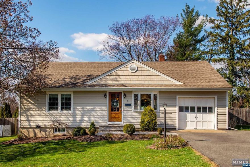 Welcome to this beautiful ranch-style home, nestled on a generous lot within a highly sought-after neighborhood. Renovated in 2018, this home boasts an inviting open-concept layout, central air, hardwood flooring throughout and a spacious kitchen outfitted with granite countertops and stainless steel appliances. The finished basement offers a sprawling recreational area with direct access to the backyard, complemented by a convenient half bathroom, laundry, abundant storage, and flexible space suitable for an office or gym. Outside, the expansive and secluded backyard includes a charming paver patio, inviting fire pit, and well-maintained landscaping. Positioned in a prime location, this property enjoys proximity to parks, schools, shopping, and convenient commuting options.