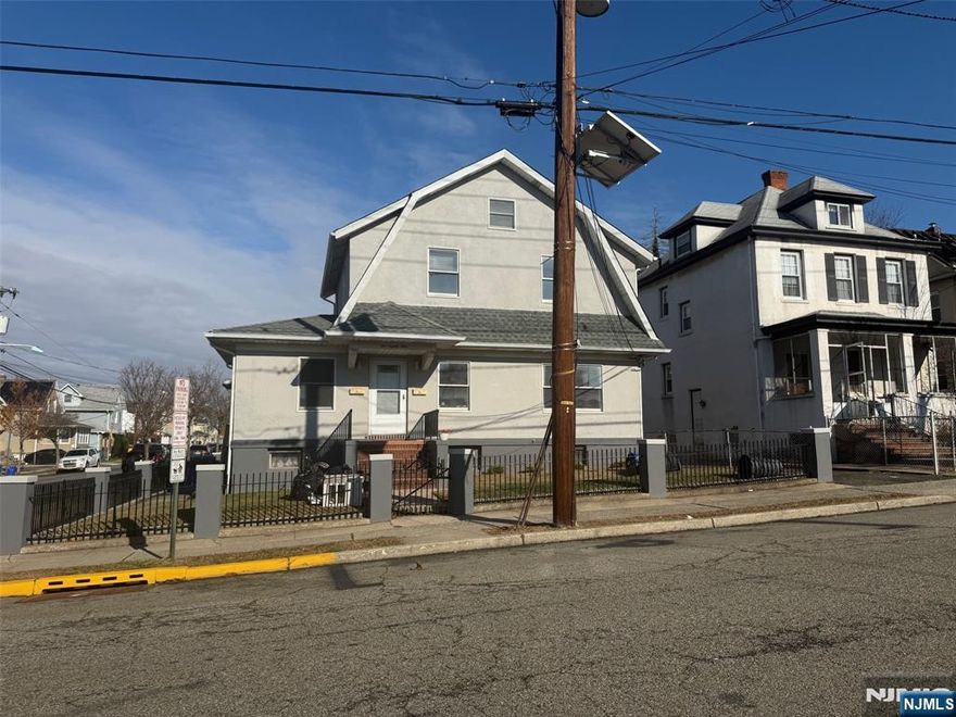 Beautifully renovated 3 - bedroom home featuring newly refinished hardwood floors, a stunning new kitchen with center island and completely updated 1 and 1/2 bathrooms as well as stackable washer/dryer hook ups. Freshly painted throughout, this spacious unit offers generous room sizes, abundant natural light and a charming fireplace - the perfect blend of modern comfort and classic character. Landlord only requires (1) month Security Deposit. Call today to preview as this unit will not last! One month agency fee is required.