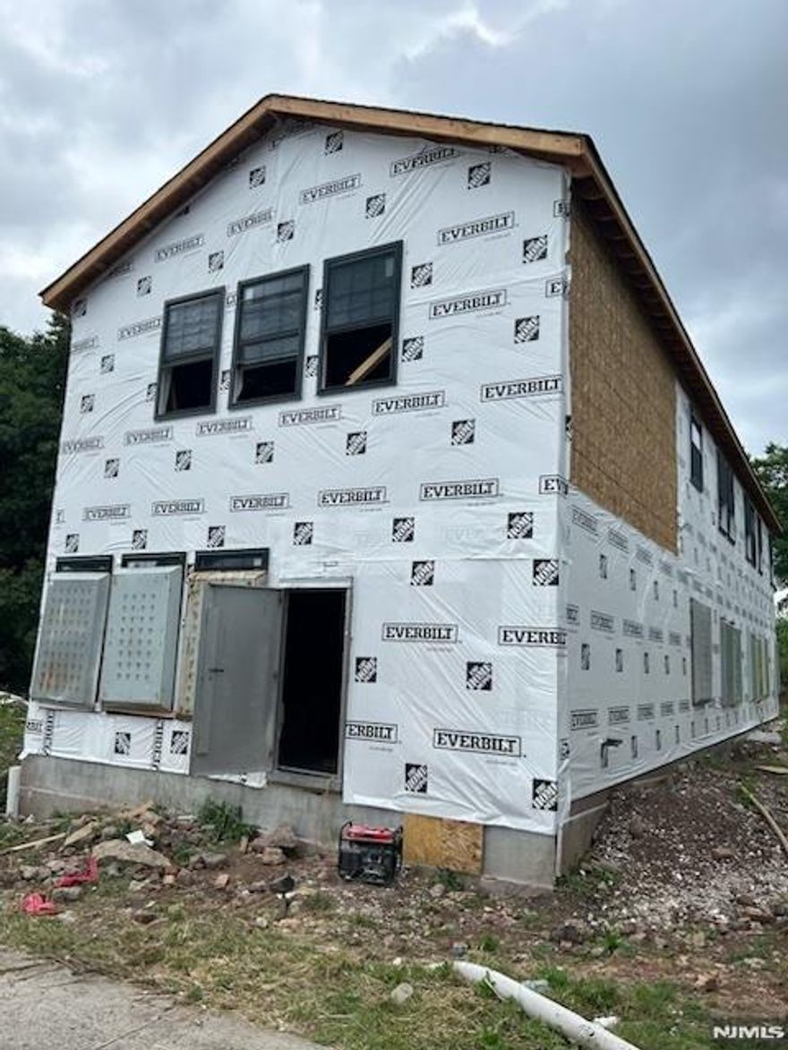 Two-family home in need of completion excellent opportunity for investors or owner-occupants seeking a renovation project. Property requires FHA 203(k) or construction loan financing. Great potential to customize and add value. This is an incomplete/unfinished new construction in need of a 100% renovation.