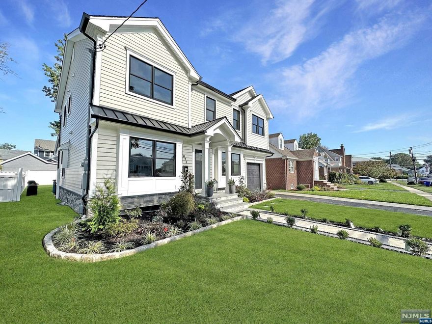 Custom Re-Built Home - 2nd Floor Completely Brand New Construction - 5 Bed, 5 Bath Home, Built Custom by the owner - Multigenerational living at its best! TOP OF THE LINE UPGRADES! 1st Floor features a Beautiful Chef Kitchen with Glossy Porcelain Counters, White Cabinet, Center Island with Seating, Dinette Nook with Abundance of windows & Storage, Formal Dining Room with Custom Wood Board. Main Bedroom with Full Bath & 2 Closets, Laundry on 1st Floor, Full Bath in hall & 2nd Bedroom! 2nd Floor: Living Room, Dining Room & Bar with Full Sink, Dishwasher, Main Suite with two Large Closets, Vaulted Ceilings, Master Bath with double Sink & Shower, LED Mirror with Anti Fog. Deck off Master with Seating, 2nd Floor features Living Rm/Dining Rm & Bar w/ Full Sink, 3 Bedrooms, & Large bathroom w/ Laundry Hook Up & Double Sink. All Closets have custom shelves - Recessed lighting throughout, 9 Ft Ceilings. -Fin Basement w/ Fam Rm, Laundry, walkout & Full Bath -