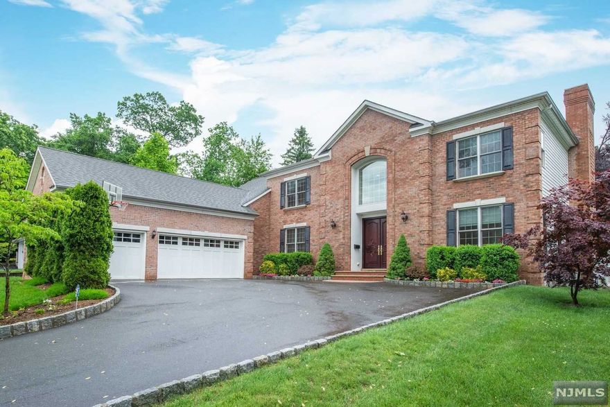 Welcome to this beautiful custom-built 5 bedroom, 5 full 2 half bath Colonial with a 3 car garage. This home features many upgrades and stunning attention to detail. Three-story elevator, fully finished basement and whole house generator. Custom millwork and moldings throughout. First Flr. w/2-story EF, Chandelier on a motorized lift, FLR, FDR, FR w/FPL, MEIK w/double ovens, Breakfast area, LR, Pantry Closet, Half Bath plus in-law suite/office with Full Bath. 2nd Flr. has an oversized primary suite with separate office, WIC, and 2 separate Full Baths with stall shower and Jacuzzi tub, Jr. Suite w/Full Bath, plus 2 large Bedrooms and Full Bath. Fully finished basement with theater, rec area, kitchenette, Half Bath plumbed for shower and office. Set back from the street with large front lawn and room for pool in fully fenced backyard. Multi-zone central AC, multi-zone HWBB heat, and central vacuum. A must see â€“ make your appointment today!"