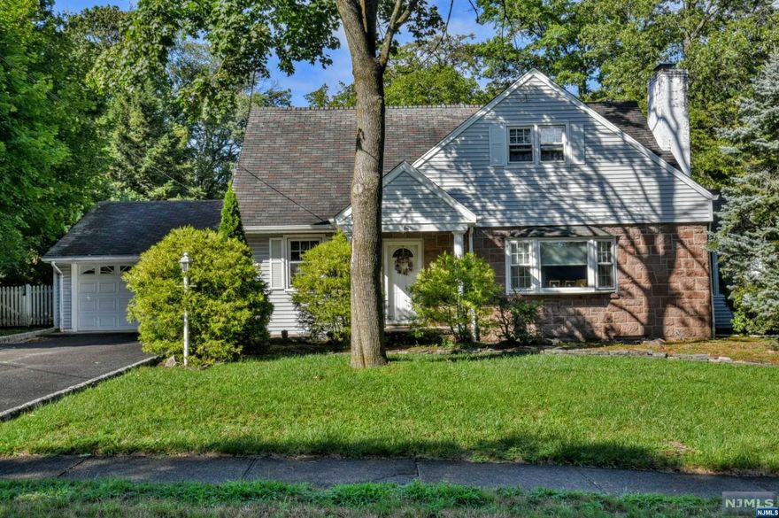 Immaculate 4 bedroom colonial located on a quiet tree lined street in the desirable Orchard School neighborhood. A welcoming covered front entryway boasts a charming brownstone facade, offering a traditional feel of this special home. Enter the sun filled living room with a wood burning fireplace and a large bay window. Step into the sunroom/den/office with wall to wall windows. The formal dining room leads to the kitchen with stainless appliances and beautiful granite countertops. The eat-in kitchen overlooks the yard and 18'x36' in ground pool. There is a slider from the eating area to enjoy looking out at the pool and patio. Mudroom has ample closets and door leading out to the yard. The large family room adjoins the kitchen. Beautiful windows provide a perfect spot to relax and enjoy the view of the pool and yard. Completing the 1st floor is a good size bedroom and an updated full bathroom. The 2nd floor has 3 large bedrooms and an updated full bathroom.