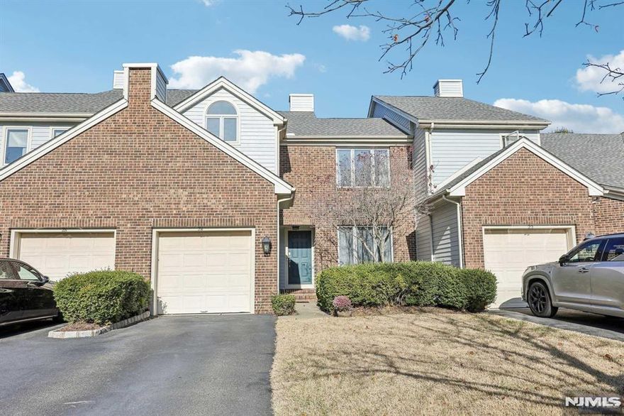 Welcome to Longview at Montville,an exceptional townhome community offering effortless living! This well maintained Christie model features 2 BR's, a 1st fl Den (optional 3rd BR),Loft,and 2.5 Baths. Step inside to a bright, open layout w/ natural light streaming through skylights, wall-to-wall windows, and vaulted ceilings. The main level includes a spacious LR w/ HW floors, a wood-burning FP & Dining Rm. The EIK boasts cherry cabinets, granite counters,stainless steel appliances, and sliding doors leading to a private patio. Upstairs, enjoy a versatile Loft space. The Primary Suite offers vaulted ceilings, a walk-in closet, and a roomy Bathroom designed for two.The en-suite 2nd BR has two double closets and its own Bath. Additional highlights include a 1-car garage with storage, dual-zone HVAC (2020), smart home features (thermostats, locks, security, and garage), and a finished basement with Rec Room, laundry & more storage. Resort style amenities incl clubhouse,gym,pool & more!